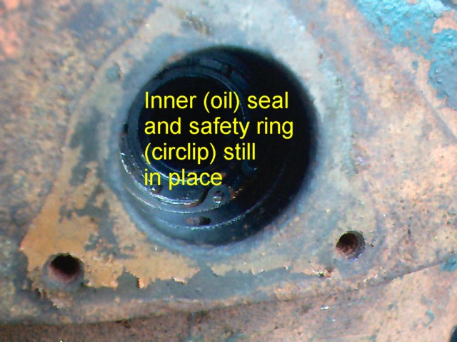 Outer seal and locking ring removed, inner seal still in place